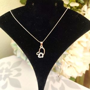 Open double heart necklace